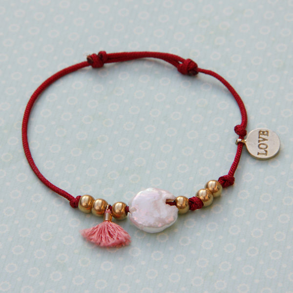 Pulsera pompon rojo y rosa